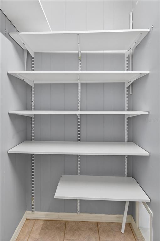 7802 Hardwick Drive, Unit 1116 New Port Richey, FL 34653 - Photo 28 of 73 a view of a room with shelf