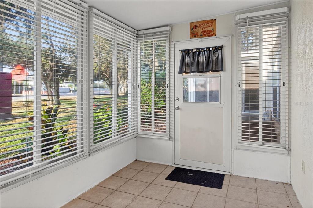 7802 Hardwick Drive, Unit 1116 New Port Richey, FL 34653 - Photo 43 of 73 a view of a door with a glass door