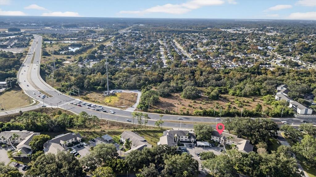 7802 Hardwick Drive, Unit 1116 New Port Richey, FL 34653 - Photo 65 of 73 an aerial view of a house with a garden