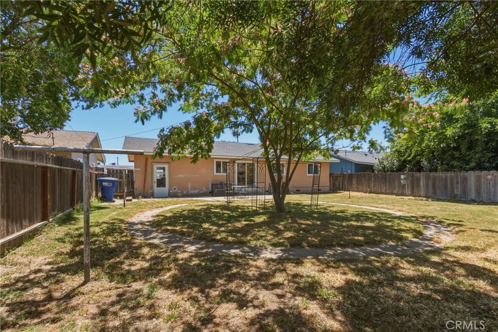 6812 Helton Street Winton, CA 95388 - Photo 21 of 24 a house that has a tree in front of it