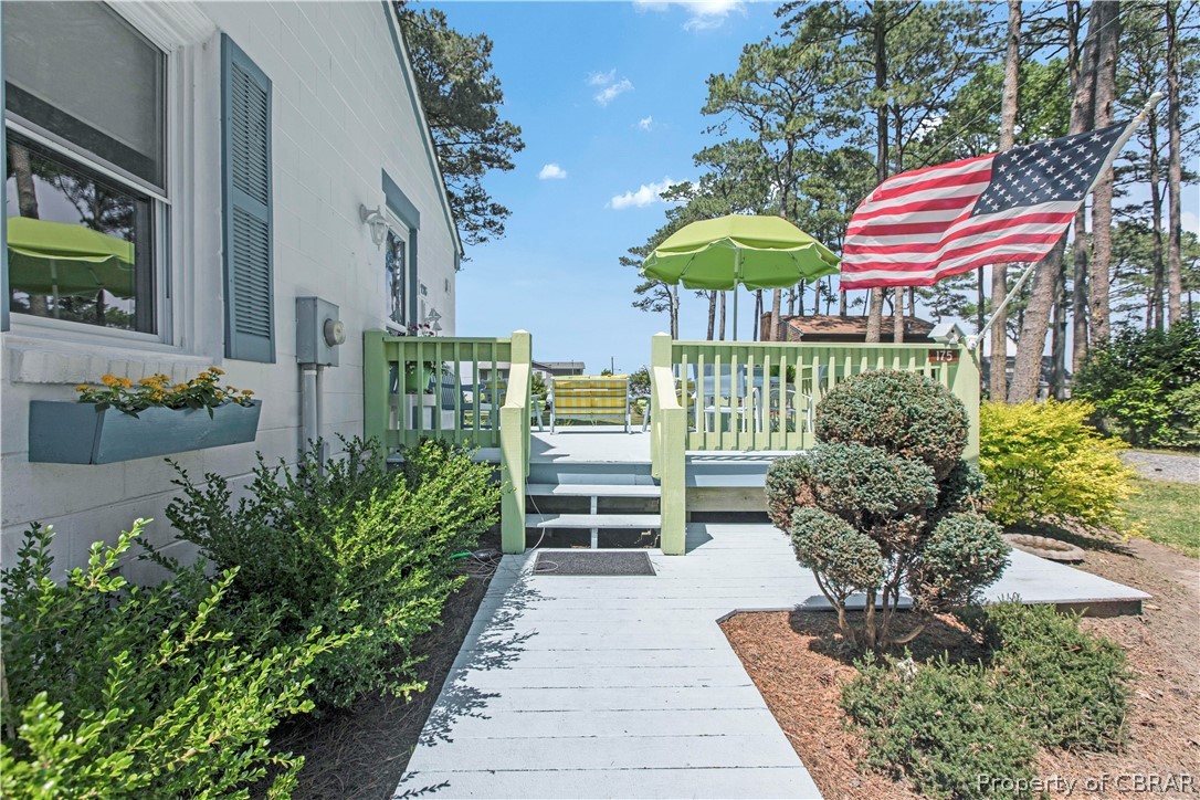 175 Seaside Way Gwynn, VA 23076 - Photo 46 of 48 a view of a chairs and table in the patio