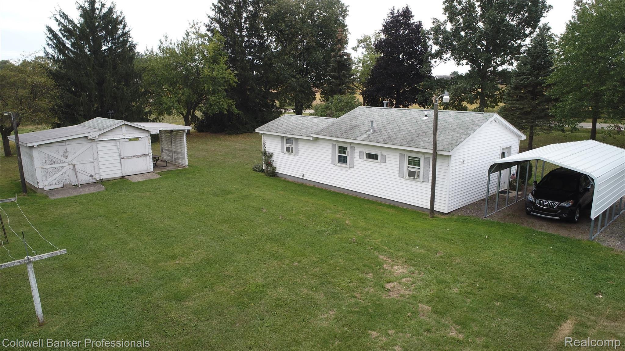 2947 Parmenter Road Corunna, MI 48817 - Photo 14 of 51 Back of house.JPG
