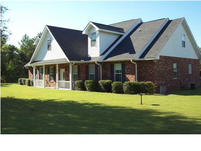 2572 Richardson Road Crestview, FL 32539 - Photo 1 of 24 a view of a house with a backyard