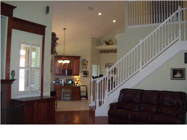 2572 Richardson Road Crestview, FL 32539 - Photo 2 of 24 a black and white living room with wooden floor