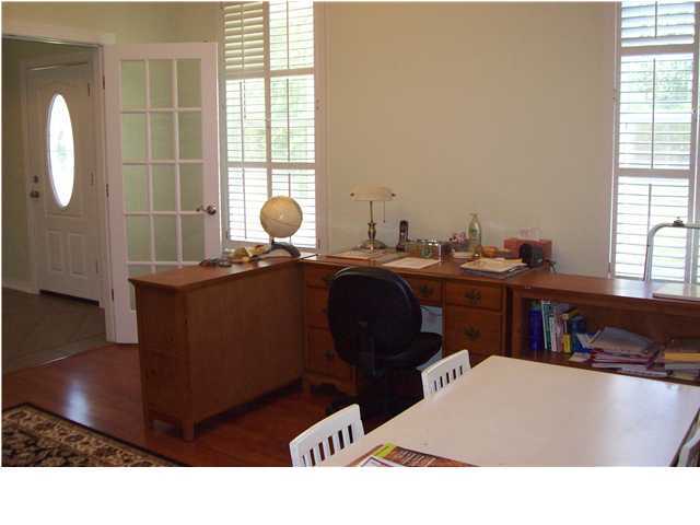 2572 Richardson Road Crestview, FL 32539 - Photo 16 of 24 a living room with a couch and a large window