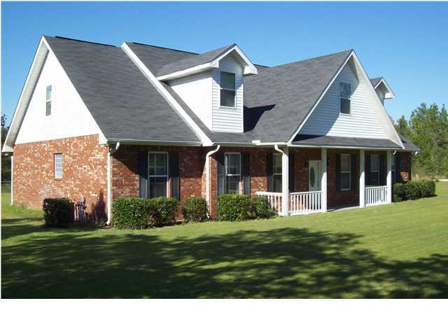 2572 Richardson Road Crestview, FL 32539 - Photo 21 of 24 a front view of a house with a yard