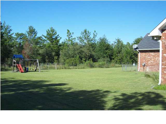 2572 Richardson Road Crestview, FL 32539 - Photo 22 of 24 a black and white photo of a golf course