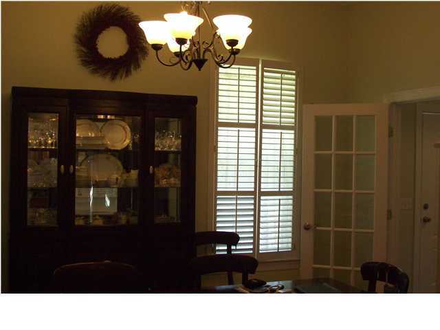2572 Richardson Road Crestview, FL 32539 - Photo 6 of 24 a bathroom with a sink a light fixture and a window