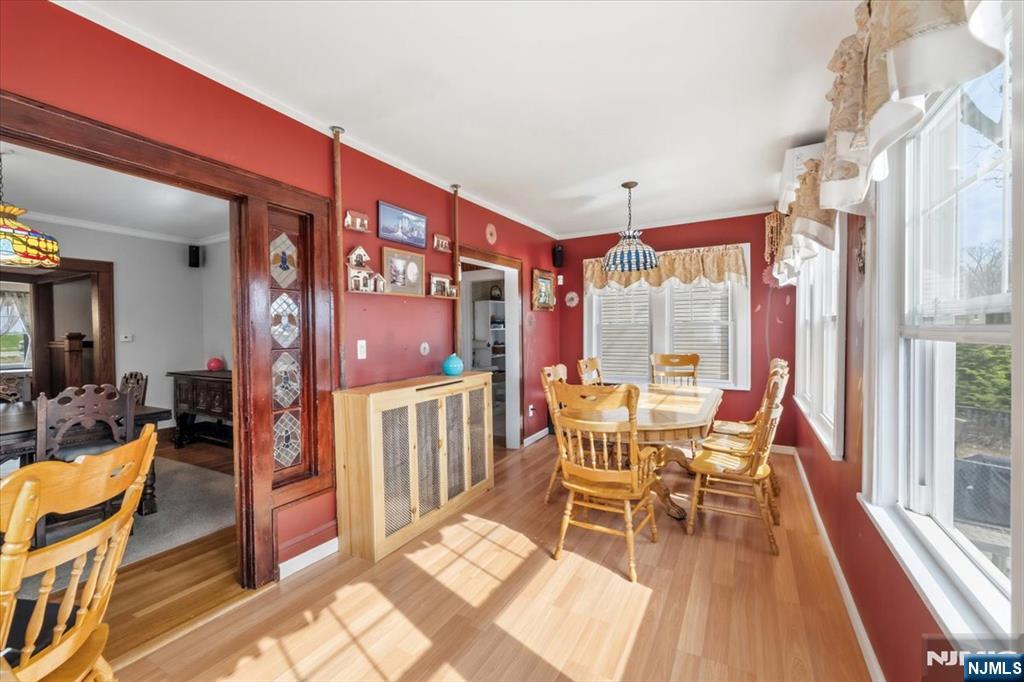 119 Overpeck Avenue Ridgefield Park, NJ 07660 - Photo 9 of 44 a view of a dining room with furniture window and wooden floor