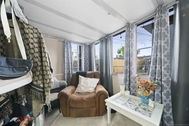 a bathroom with a sink toilet and a mirror