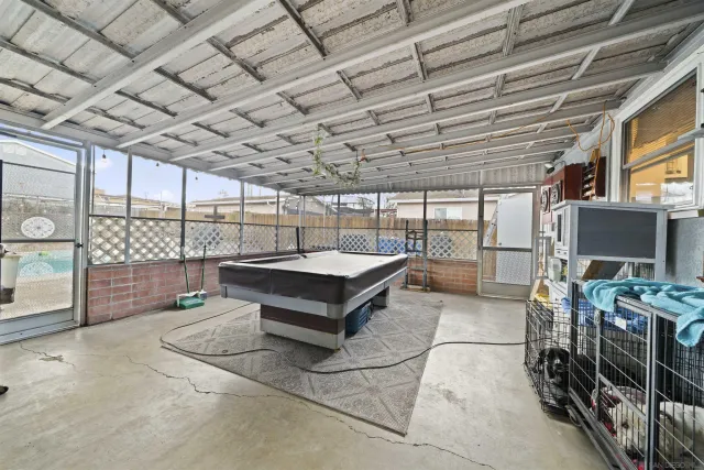 a view of a room with wooden walls