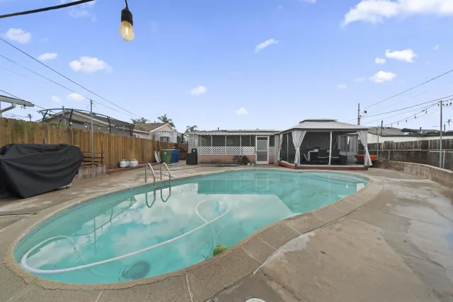 a house view with a parking space