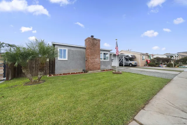 a house view with a garden space