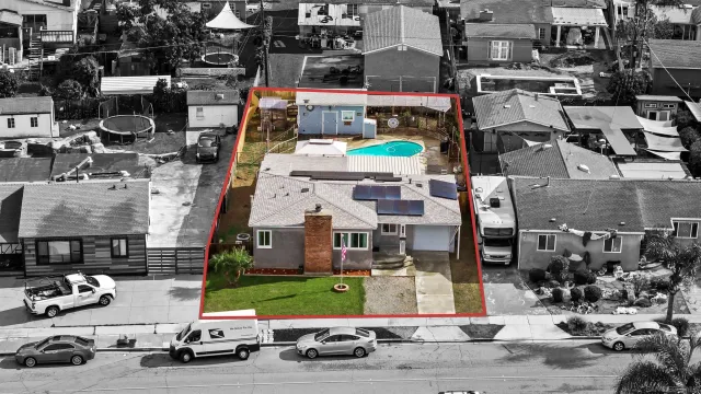 an aerial view of a house with a garden
