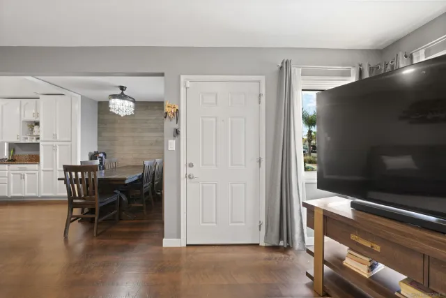 a view of a livingroom with furniture and wooden floor