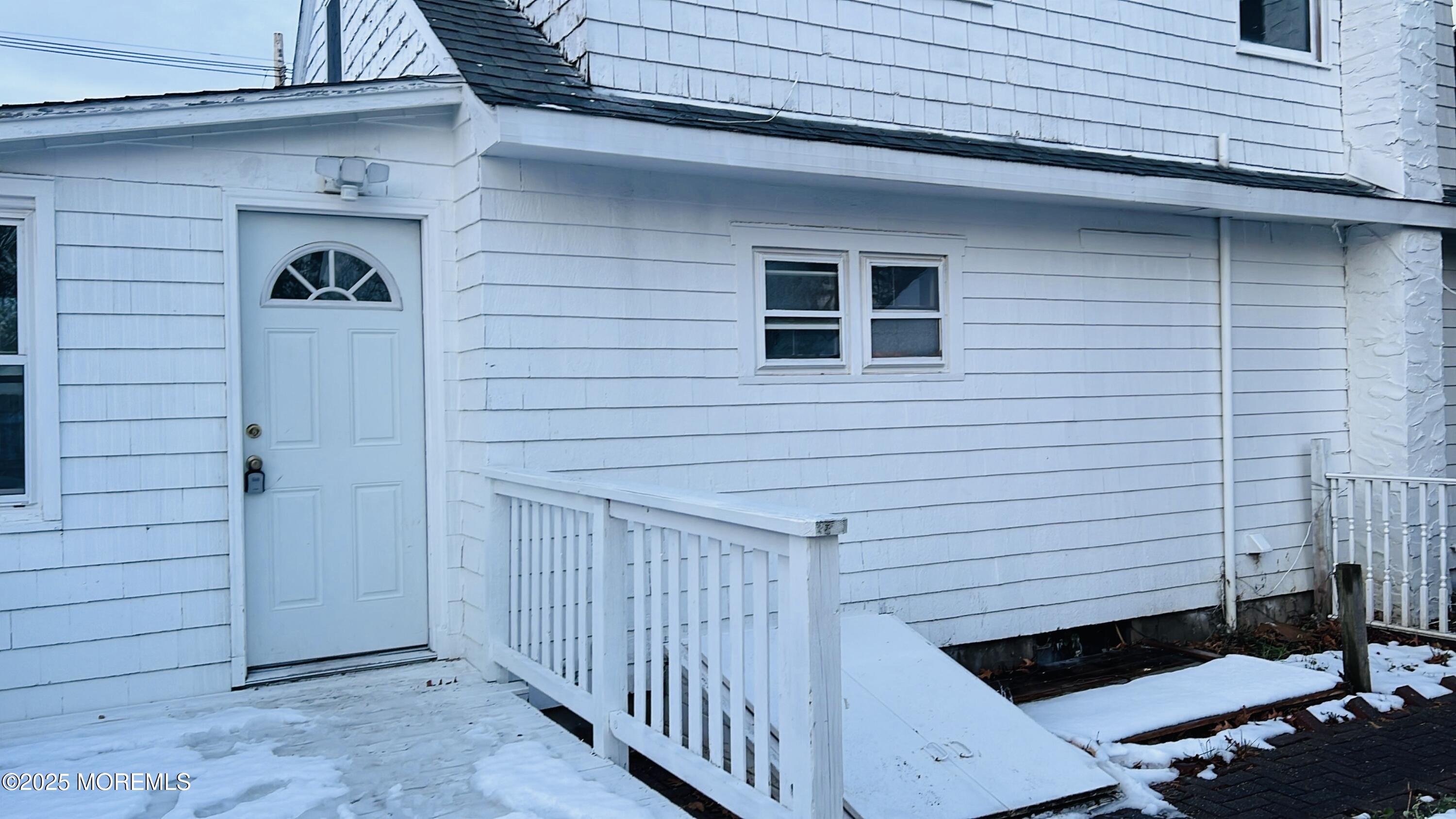 a view of front door and porch