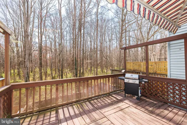 a balcony with wooden floor