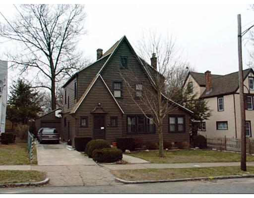 115 Wayne Street Springfield, MA 01118 - Photo 1 of 1 a front view of a house with garden