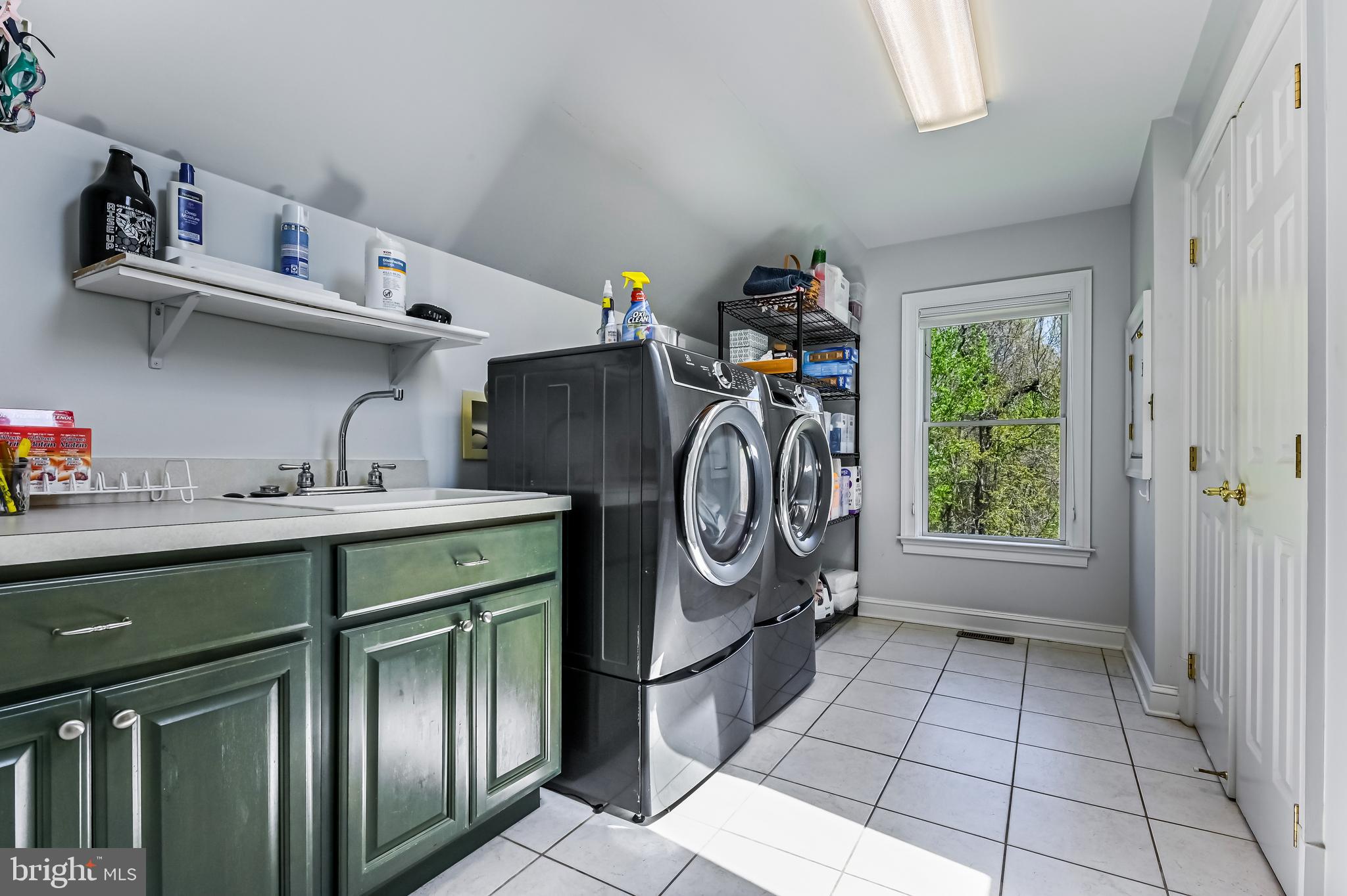 3303 Hidden River View Road Annapolis, MD 21403 - Photo 47 of 78 Main level laundry room w/ utility sink