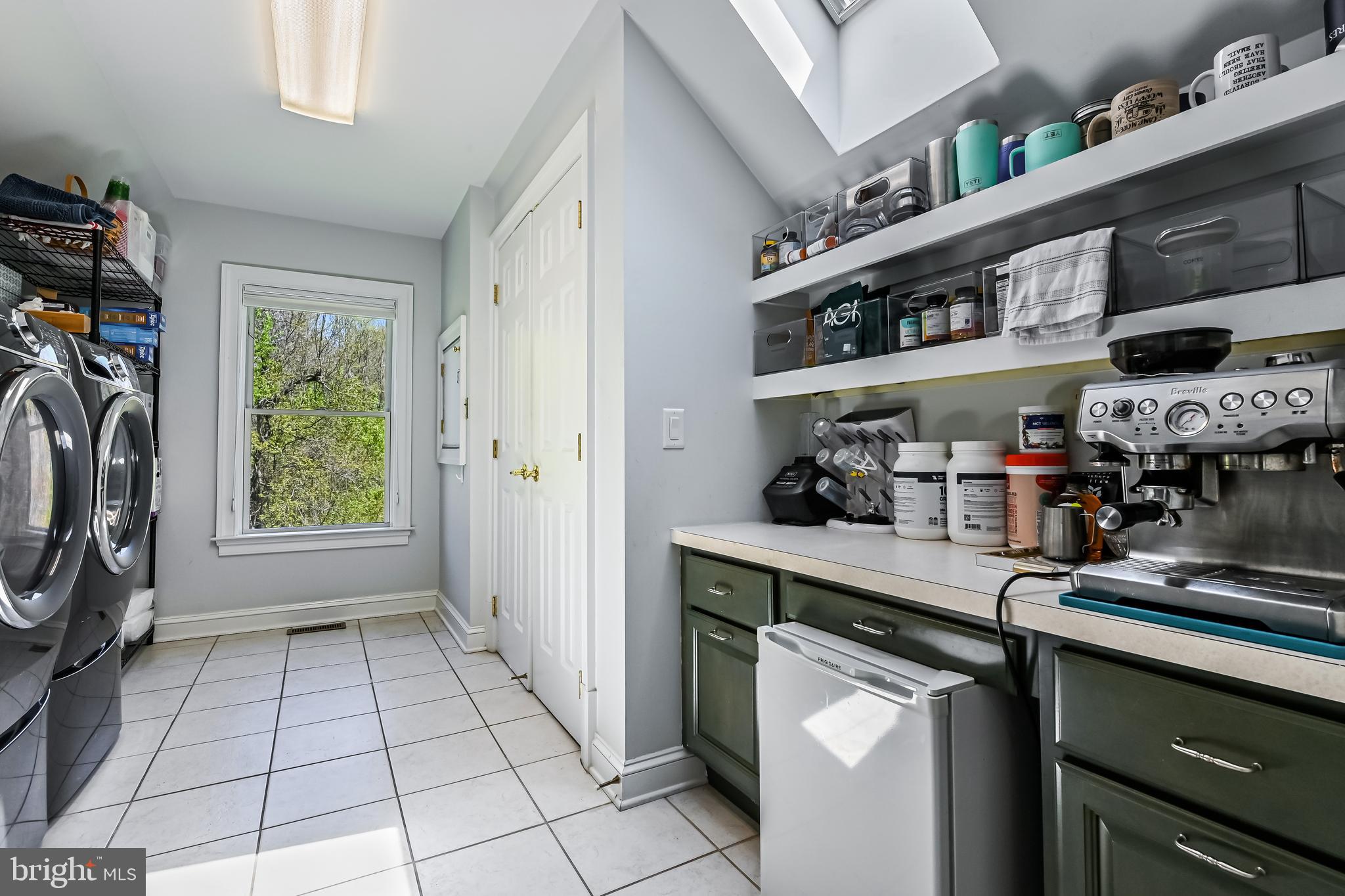 3303 Hidden River View Road Annapolis, MD 21403 - Photo 48 of 78 Main level laundry room w/ lots of storage