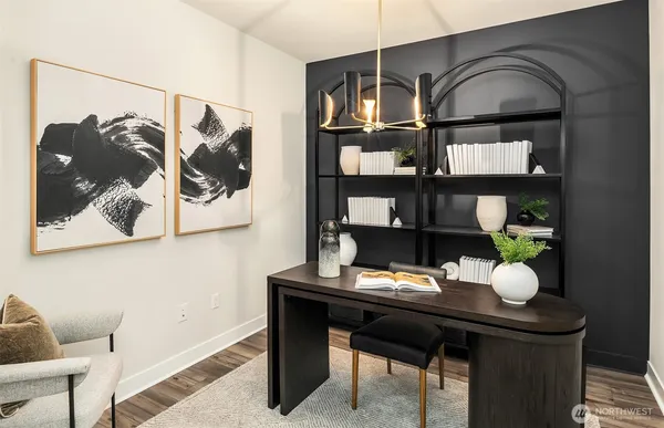 a workspace with furniture and window
