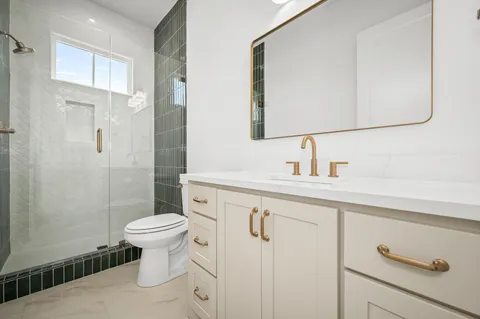 a front view of a house with a yard and porch