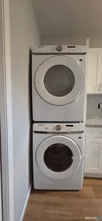 a utility room with dryer and washer