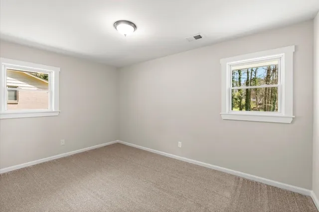 an empty room with windows