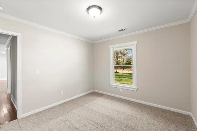 an empty room with window