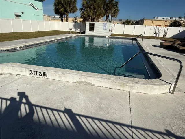 a view of a back yard of the house