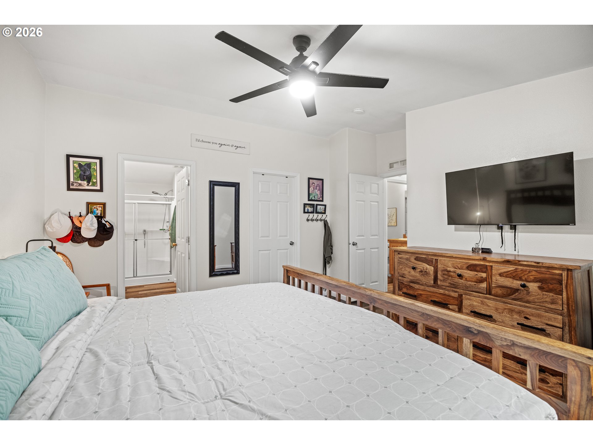 1050 North Cedar Point Road, Unit C09 Coquille, OR 97423 - Photo 19 of 38 a bedroom with a bed and a flat screen tv