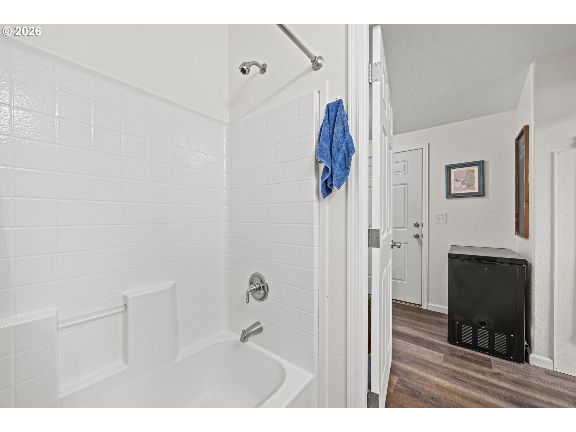 1050 North Cedar Point Road, Unit C09 Coquille, OR 97423 - Photo 23 of 38 a picture of a room with wooden floor and fireplace
