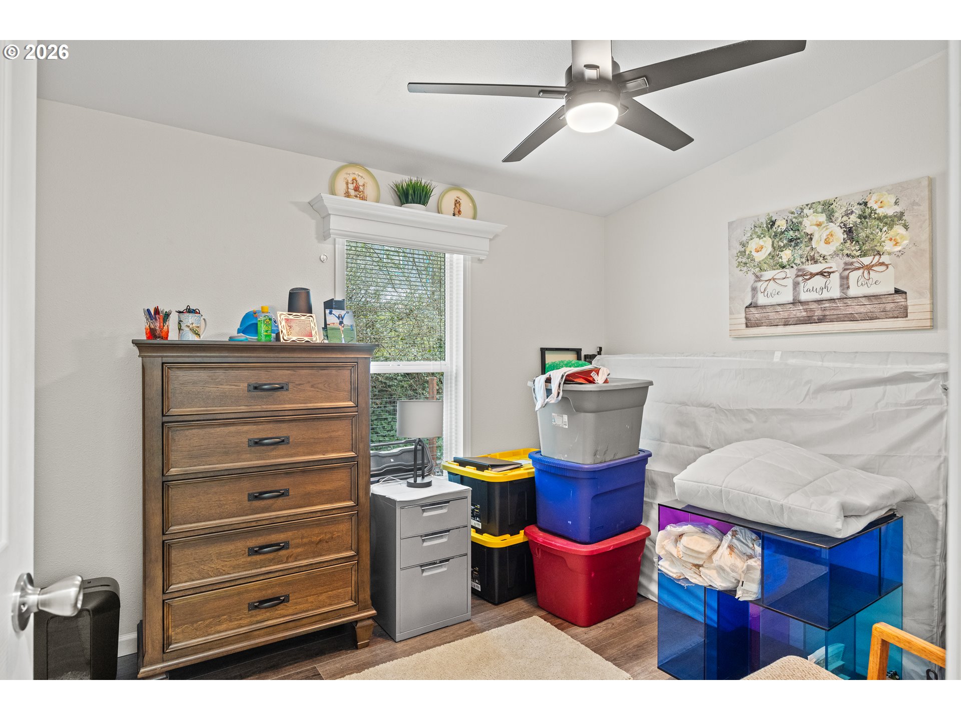 1050 North Cedar Point Road, Unit C09 Coquille, OR 97423 - Photo 24 of 38 a living room with furniture a rug and a chandelier