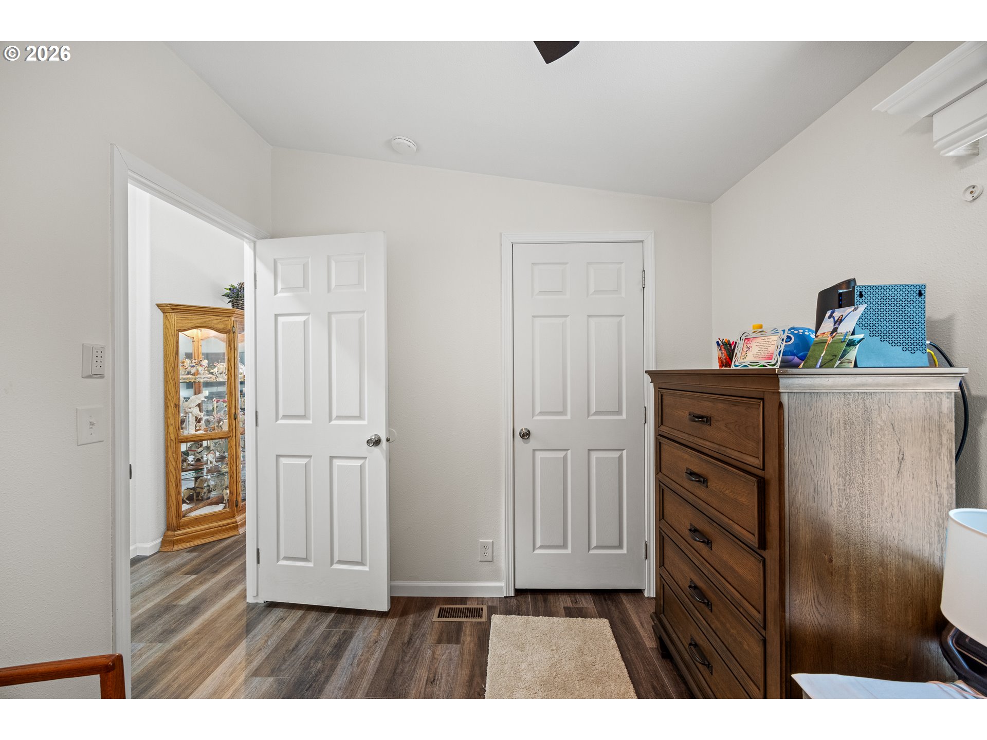 1050 North Cedar Point Road, Unit C09 Coquille, OR 97423 - Photo 25 of 38 a kitchen with cabinets and wooden floor