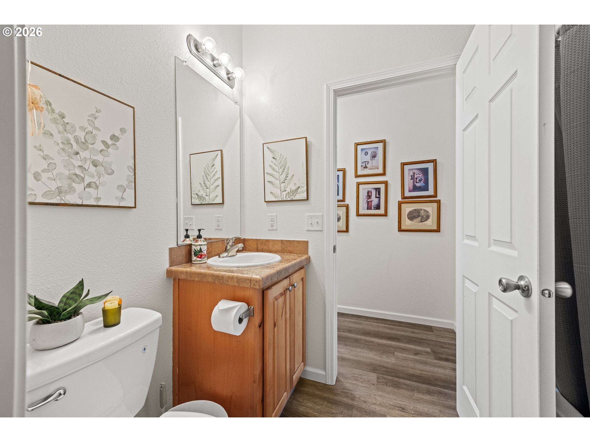 1050 North Cedar Point Road, Unit C09 Coquille, OR 97423 - Photo 26 of 38 a view of bathroom with a washer and dryer