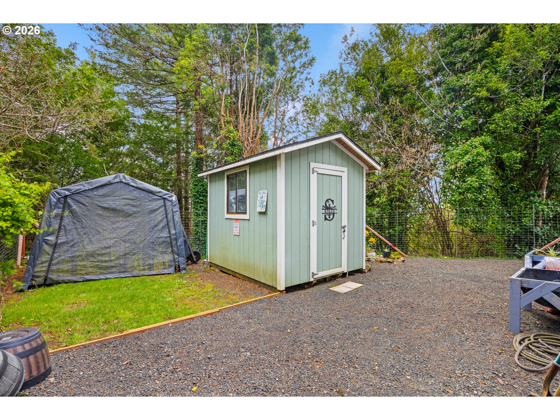 1050 North Cedar Point Road, Unit C09 Coquille, OR 97423 - Photo 32 of 38 a view of backyard with a garden and entertaining space