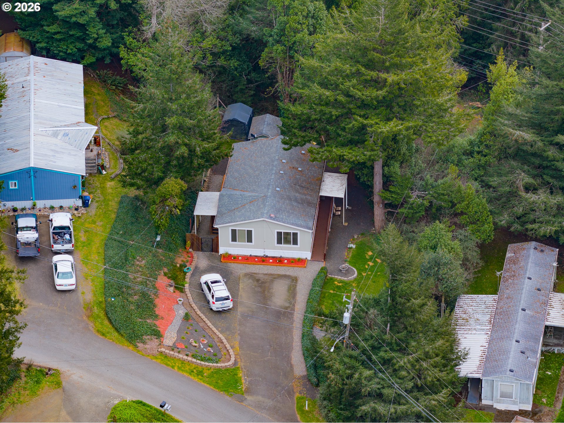 1050 North Cedar Point Road, Unit C09 Coquille, OR 97423 - Photo 35 of 38 an aerial view of a house with swimming pool