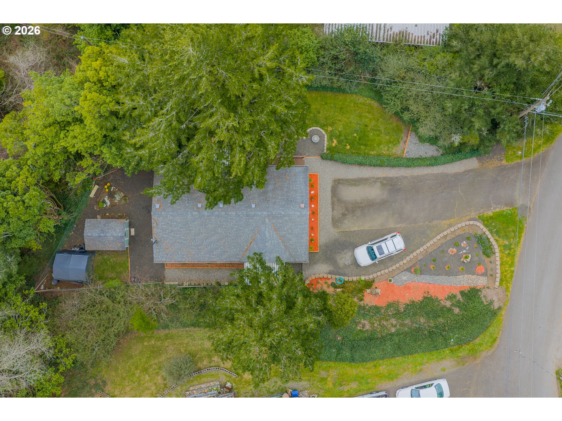 1050 North Cedar Point Road, Unit C09 Coquille, OR 97423 - Photo 36 of 38 an aerial view of a house