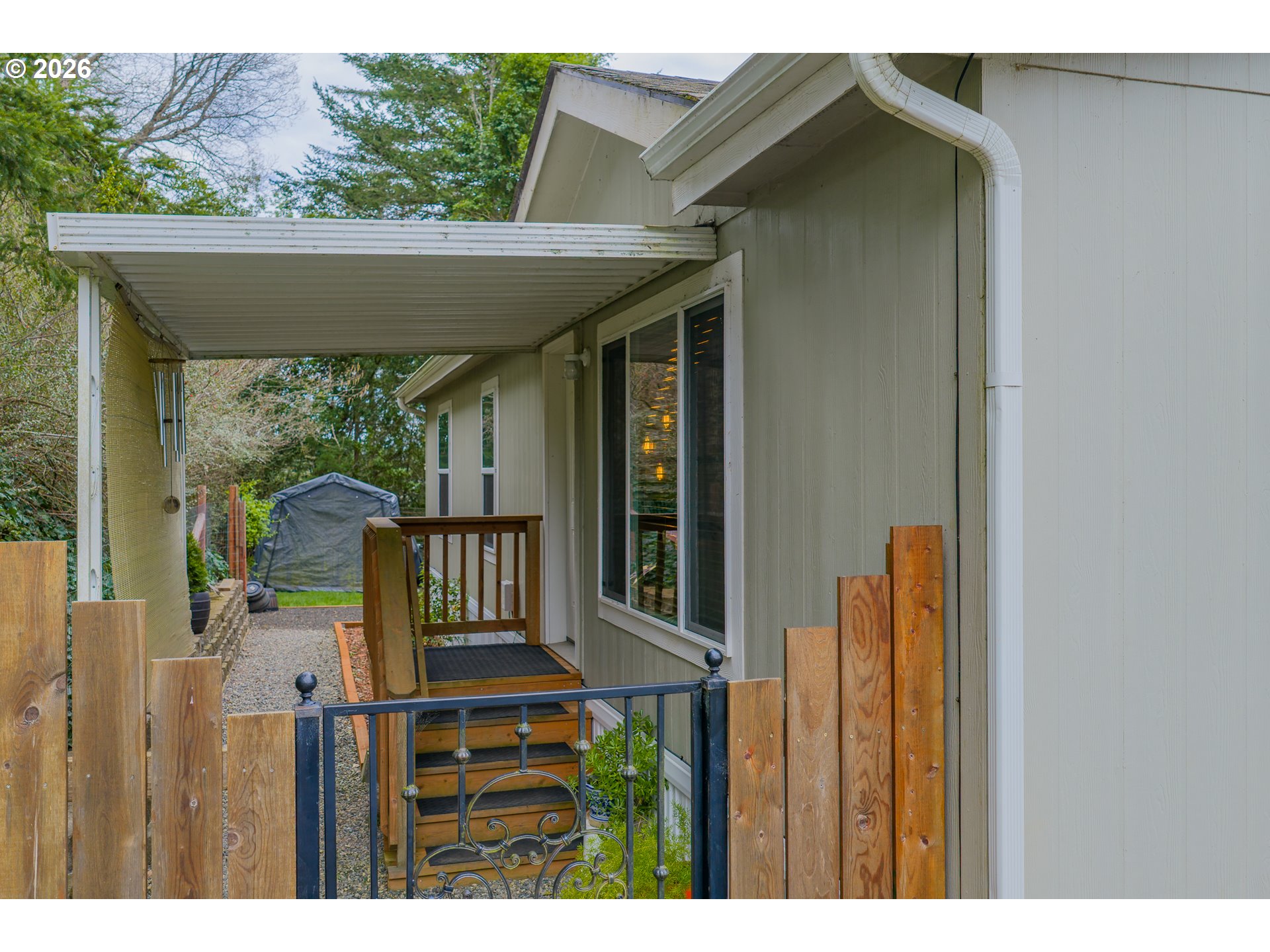 1050 North Cedar Point Road, Unit C09 Coquille, OR 97423 - Photo 6 of 38 a view of a porch with furniture and yard
