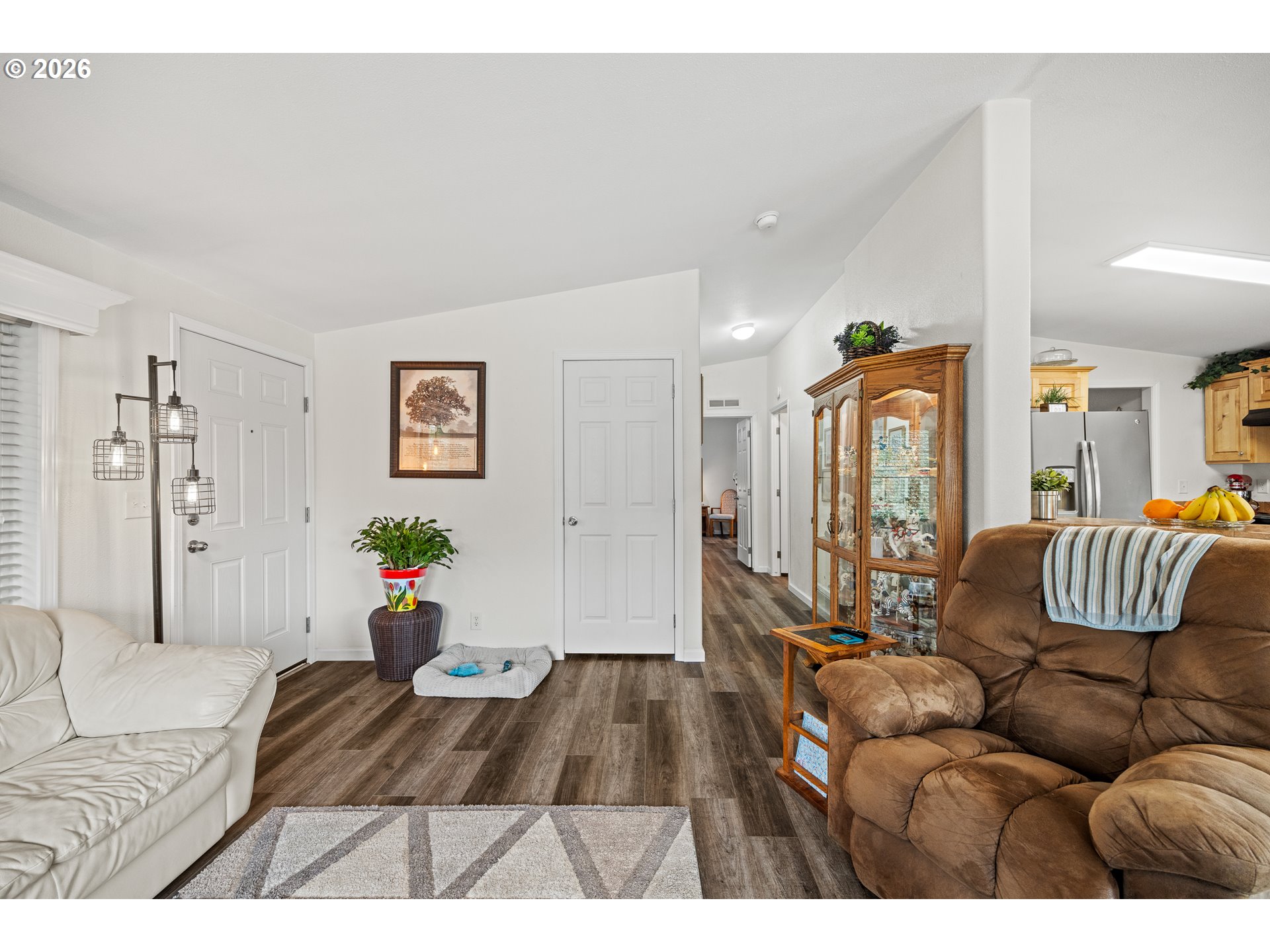 1050 North Cedar Point Road, Unit C09 Coquille, OR 97423 - Photo 8 of 38 a living room with furniture and wooden floor