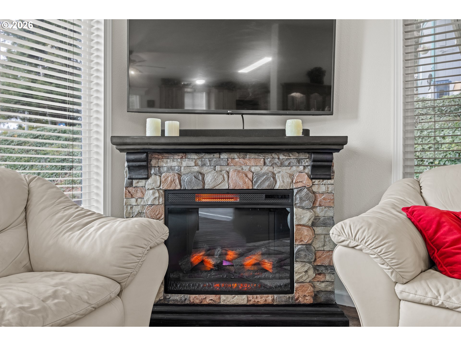 1050 North Cedar Point Road, Unit C09 Coquille, OR 97423 - Photo 10 of 38 a living room with furniture and a fireplace