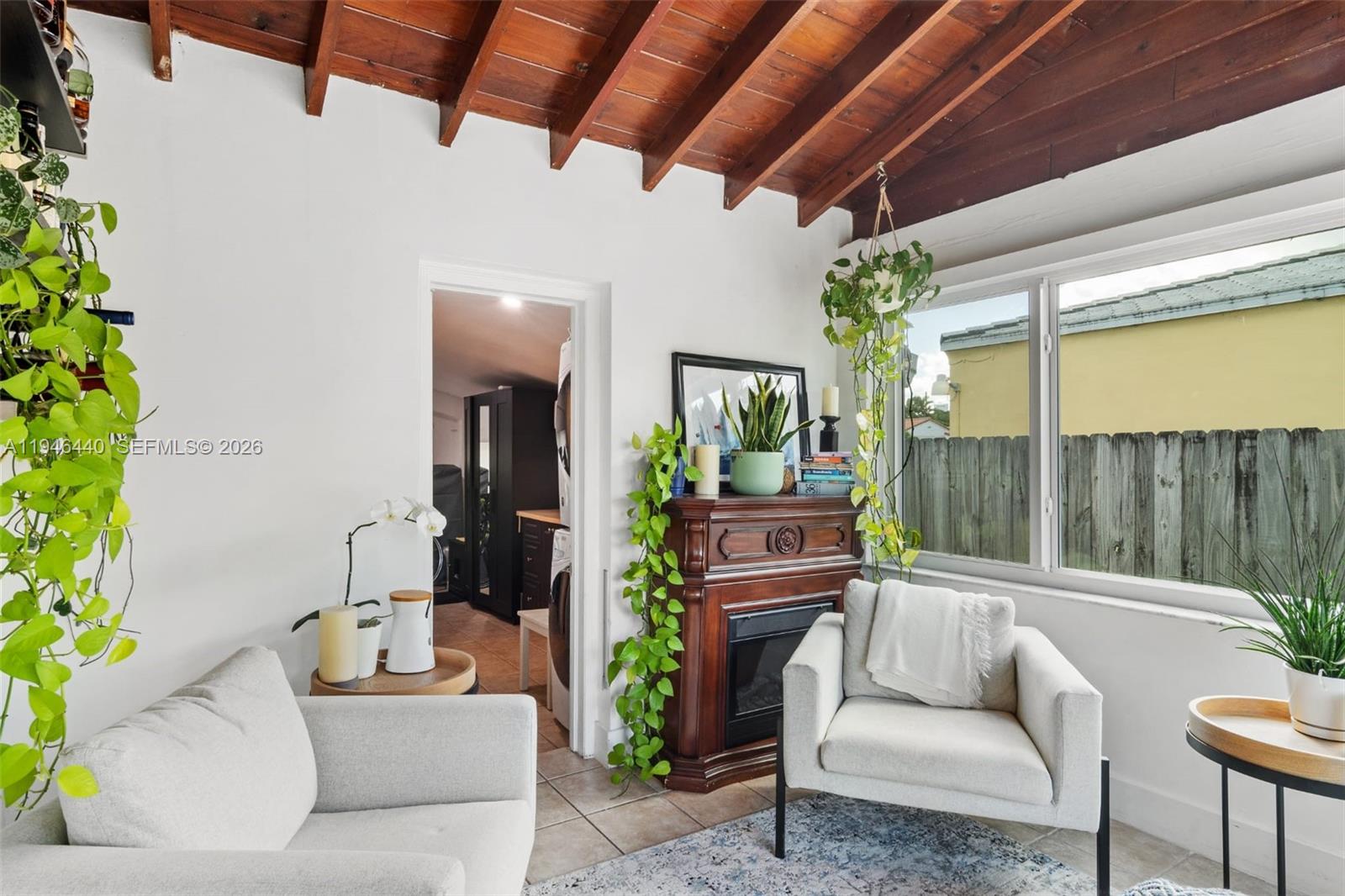 3151 Southwest 20th Street, Unit 1 Miami, FL 33145 - Photo 10 of 18 a outdoor living space with furniture and a potted plant