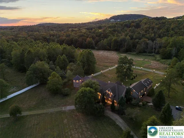 a view of a street with a yard