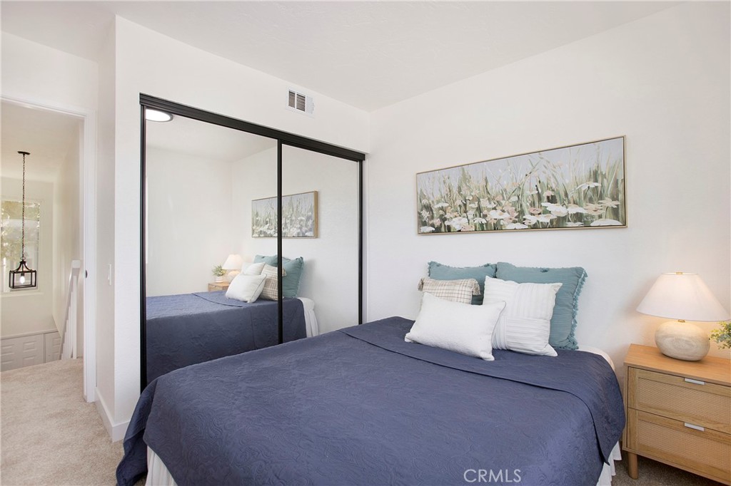 519 Breezewood Court Brea, CA 92821 - Photo 15 of 30 a bedroom with a bed and a painting on the wall