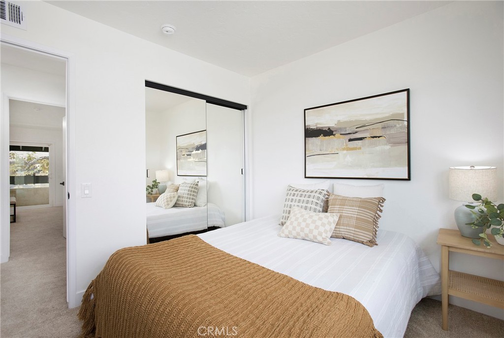 519 Breezewood Court Brea, CA 92821 - Photo 17 of 30 a bedroom with a bed and a painting on the wall