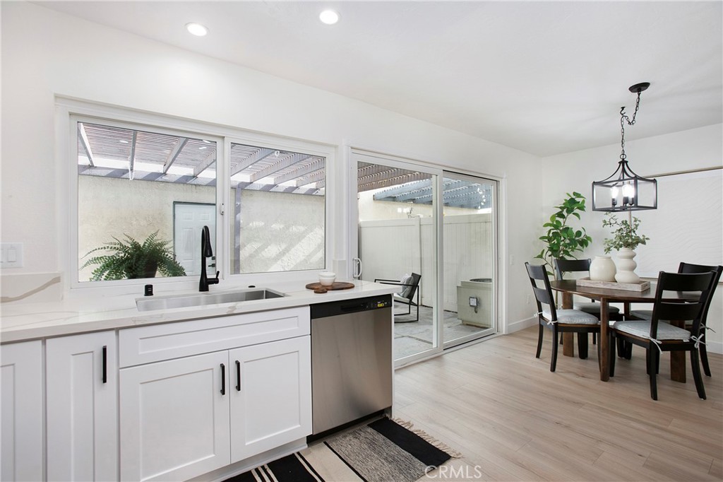 519 Breezewood Court Brea, CA 92821 - Photo 3 of 30 a kitchen with a sink and cabinets