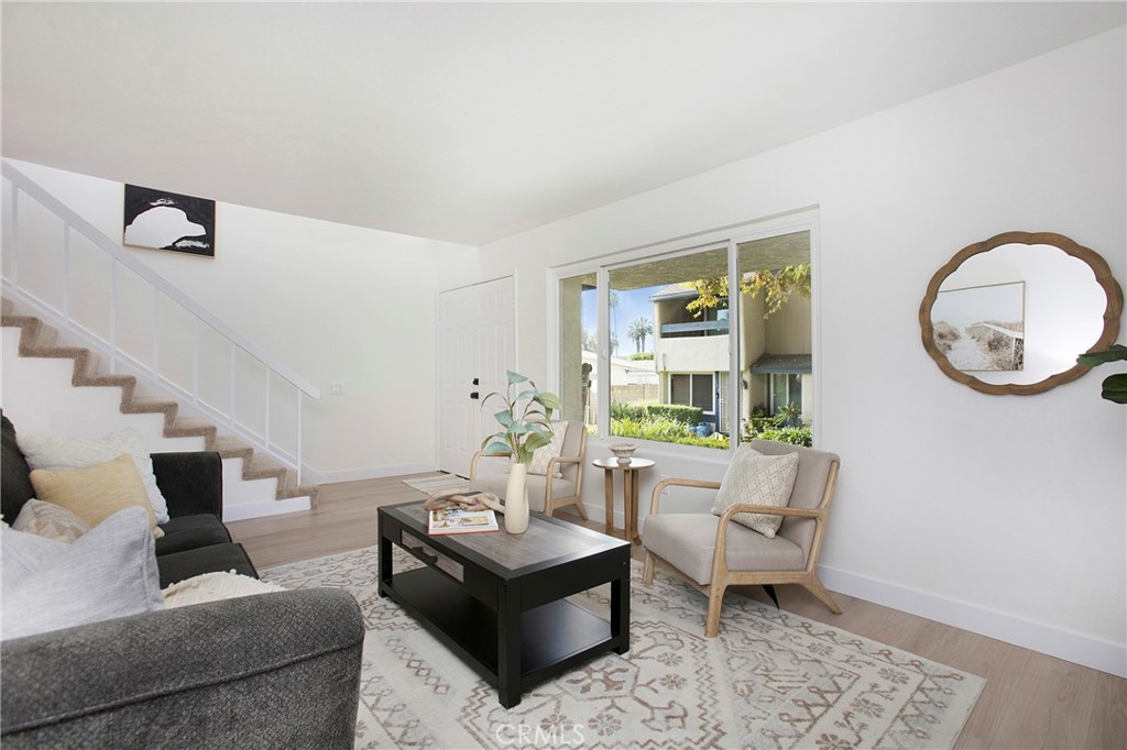519 Breezewood Court Brea, CA 92821 - Photo 7 of 30 a living room with furniture and a large window