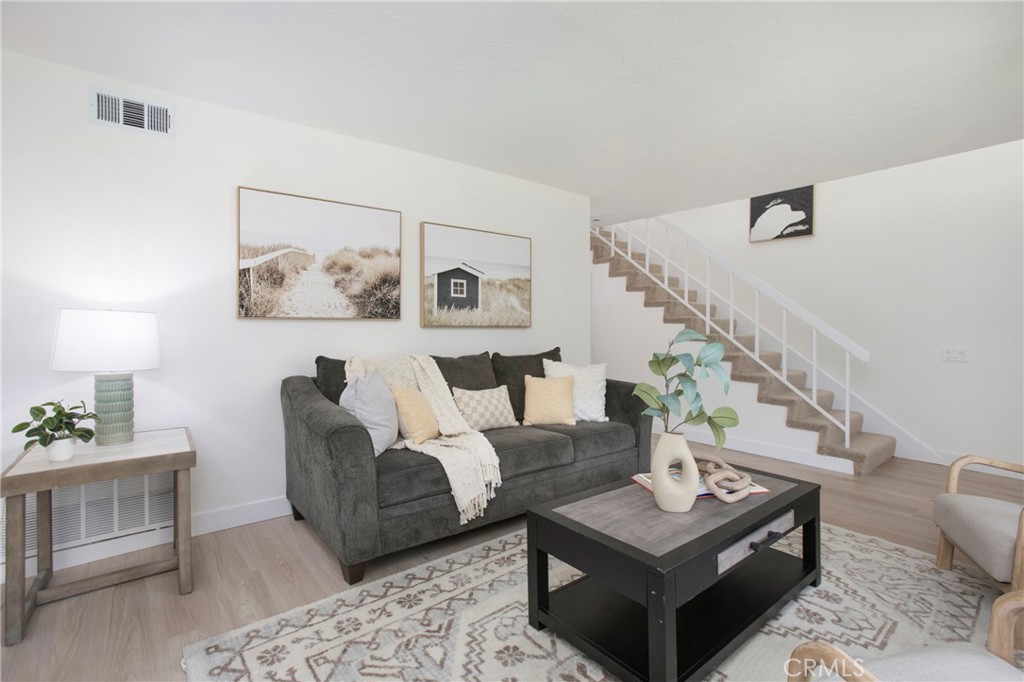 519 Breezewood Court Brea, CA 92821 - Photo 8 of 30 a living room with furniture and wooden floor