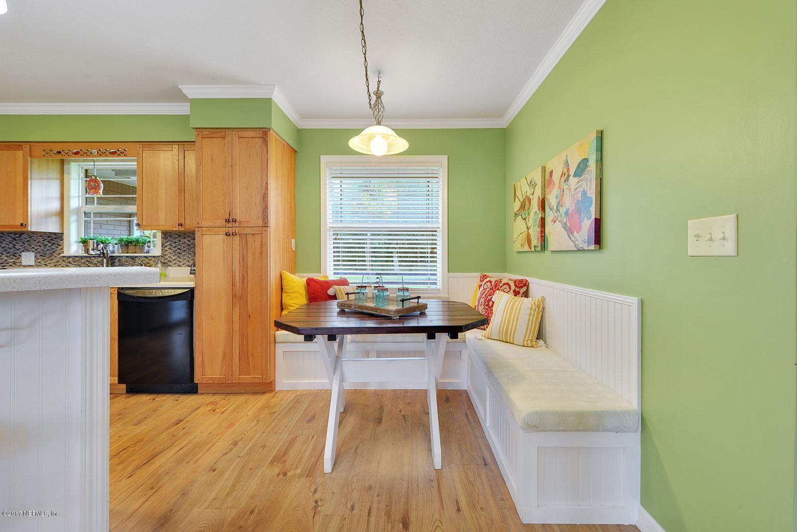 5280 Truman Pacetti Road St. Augustine, FL 32092 - Photo 12 of 34 a living room with furniture and a large window