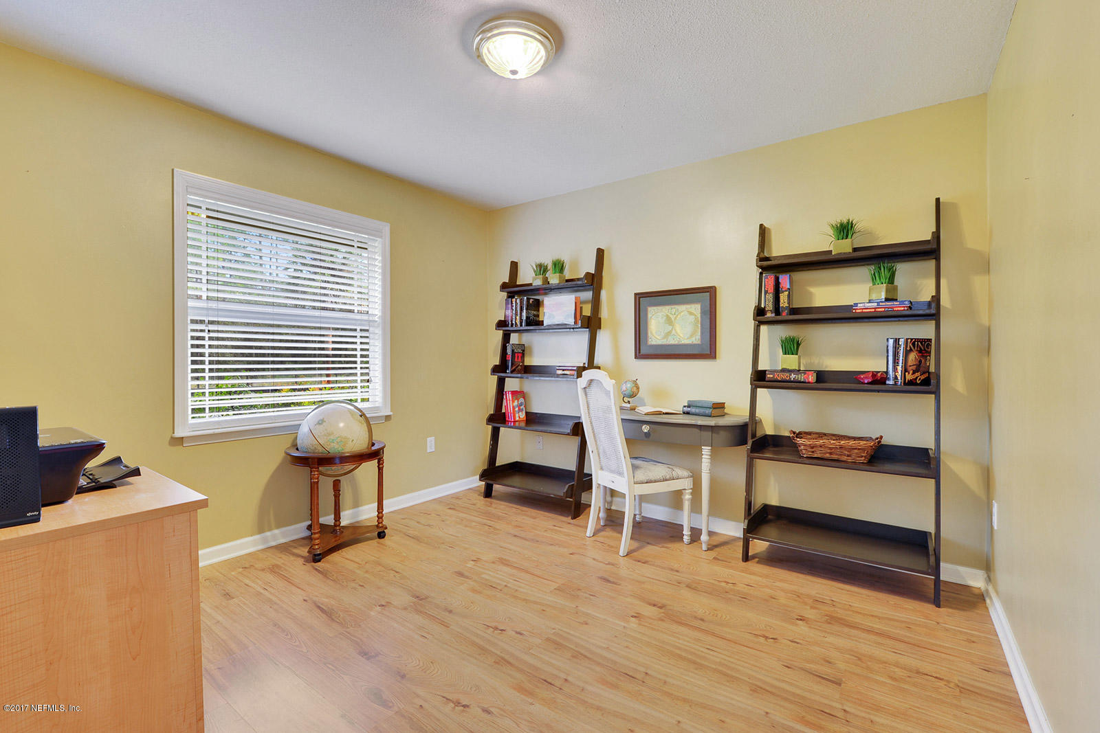 5280 Truman Pacetti Road St. Augustine, FL 32092 - Photo 18 of 34 a room with furniture and gym equipment